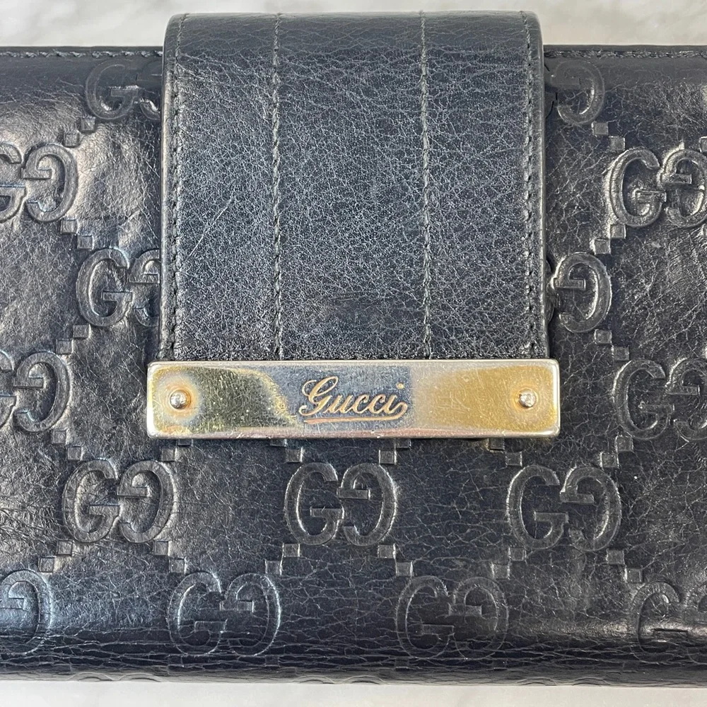Gucci Black Embossed GG Leather Wallet with Gold Nameplate